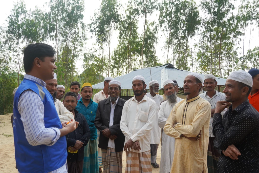 Exchanging views with people in a remote village in Bangladesh.