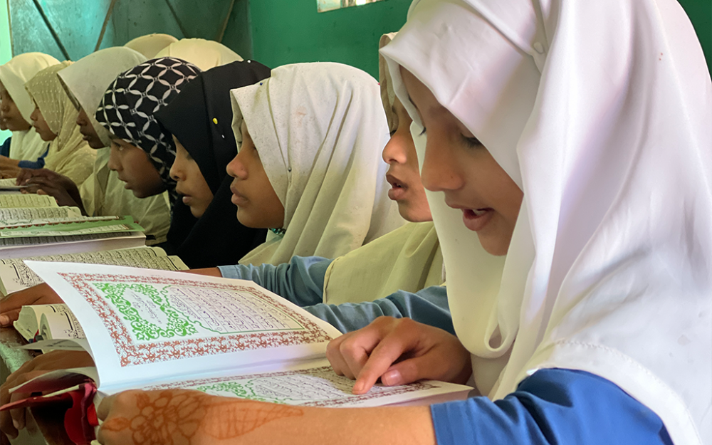 Girls Reading Quran